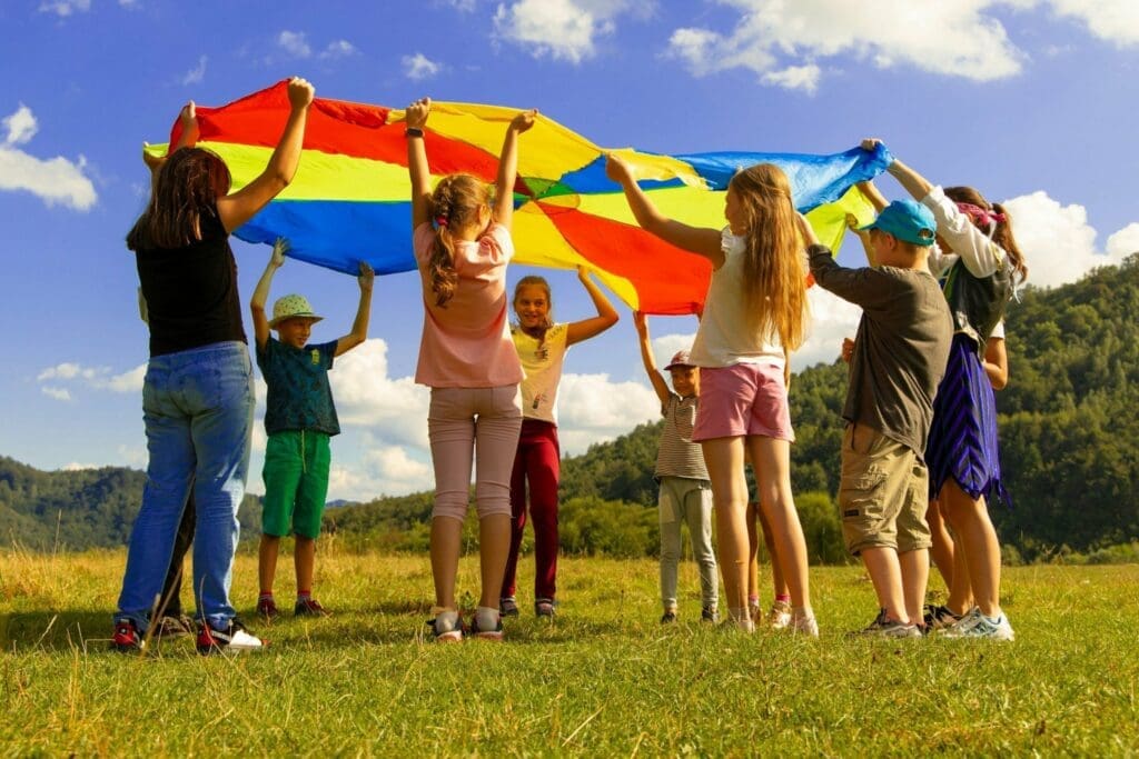 Kids flying kite during creative play therapy session